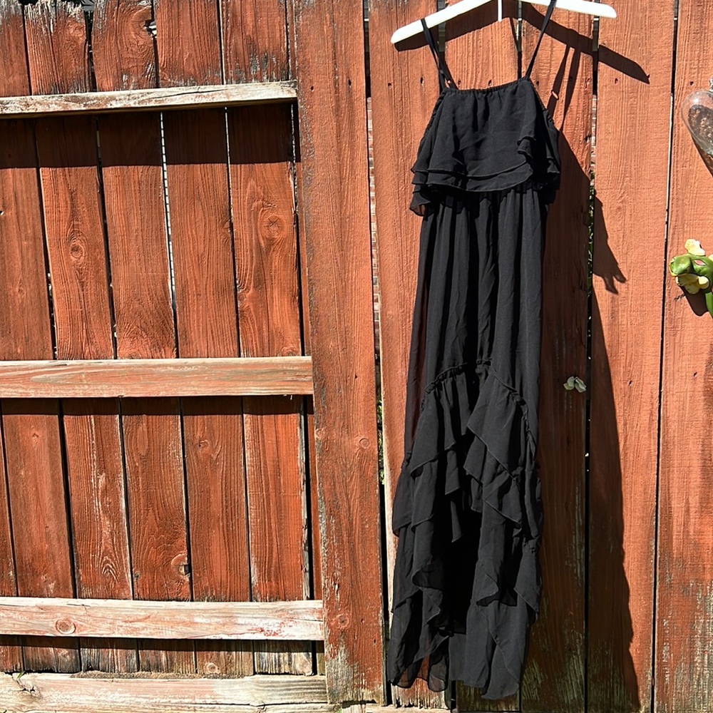 NEW WITH TAG. VENUS black hi/Lo dress size L. Retails for $69.99
